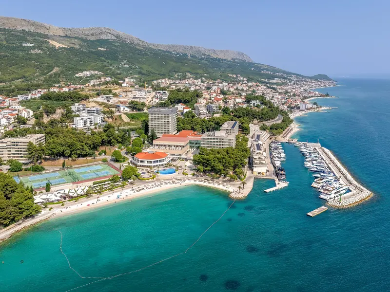 Aerial view of Hotel Le Meridien Lav with its beach and marina, Podstrana